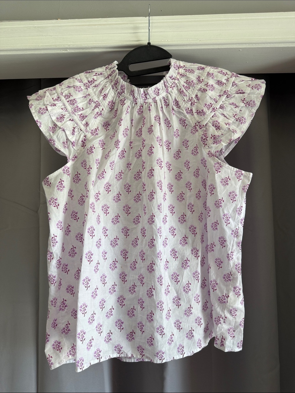 J. Crew angel sleeved blouse.